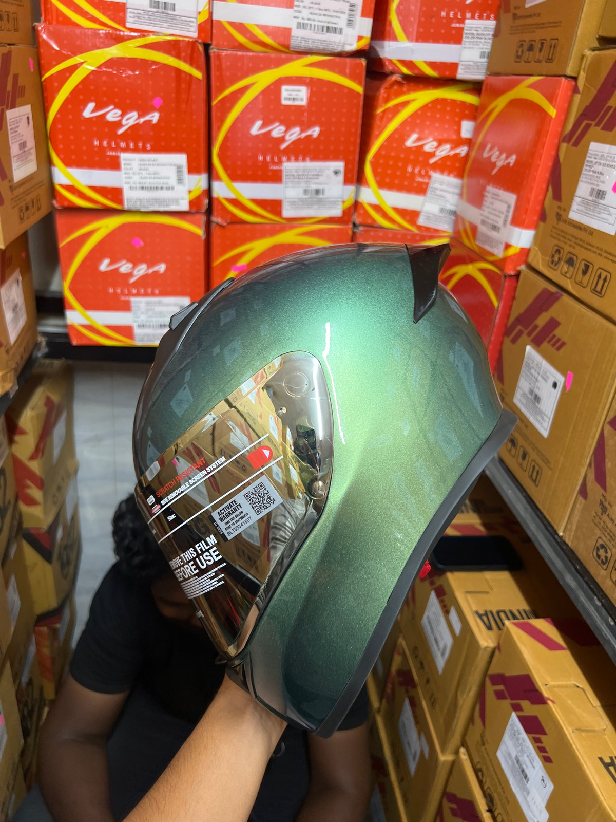 The VEGA Bolt DX Dual Tone Aqua Blue helmet offers a sleek, stylish look with its striking aqua blue and black color combination. Designed for comfort and safety, it features a well-padded interior and durable construction for your riding needs.