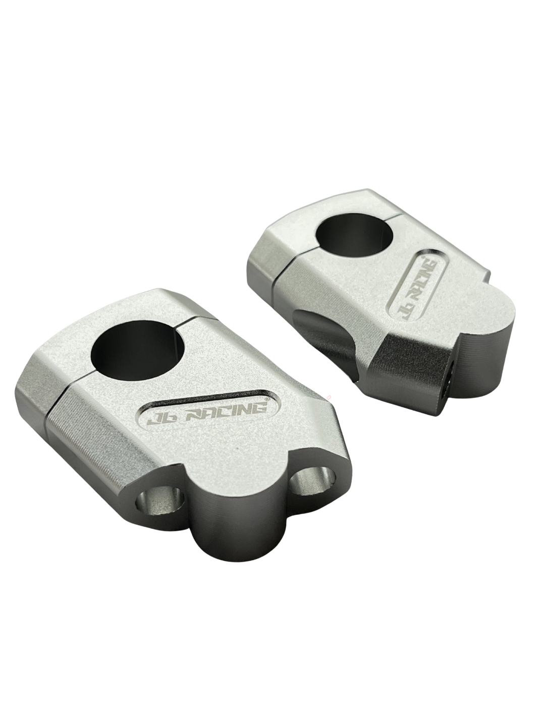 A pair of metallic silver J6 Racing motorcycle handlebar clamps on a clean white background.