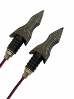 Two metallic arrowheads with cables on a white background