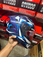 The Studds Raider Super D1 Blue N6 White helmet offers a stylish design with superior protection, ensuring safety and comfort for riders.