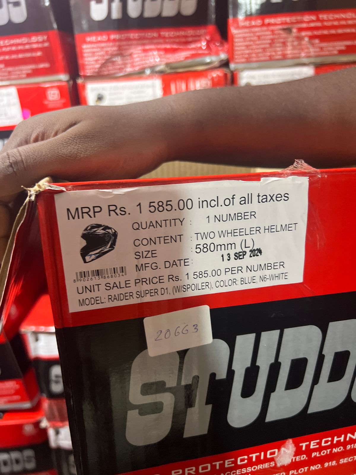 The Studds Raider Super D1 Blue N6 White helmet offers a stylish design with superior protection, ensuring safety and comfort for riders.