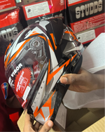The Studds Raider Super D1 Black N10 Orange helmet features a sleek design with reliable safety, offering both style and protection for riders.
