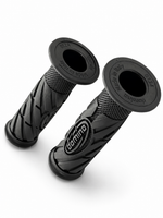 A pair of black motorcycle handlebar grips with knobby tread patterns and the 'domingo' brand logo, shown on a clean white background.