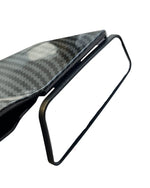 Modern chair with carbon fiber patterned seat on a white background