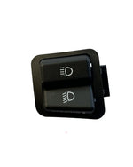 Black car switch panel with two buttons on a white background