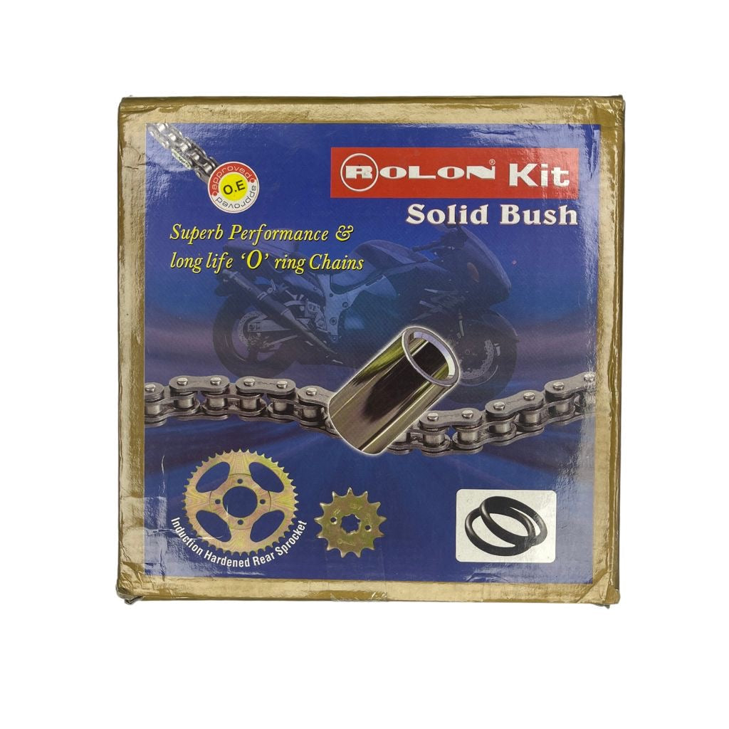 Rolon Kit Solid Bush O-ring chain packaging box, featuring a blue background with a motorcycle graphic, a chrome chain and bushing illustration, and two black O-rings shown in the lower right corner.