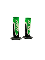 Two green and black grips with UFO logo on a white background