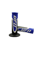 Pair of blue and black UFO handlebar grips on a white background