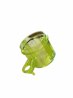 Clear green plastic cup with a handle on a white background