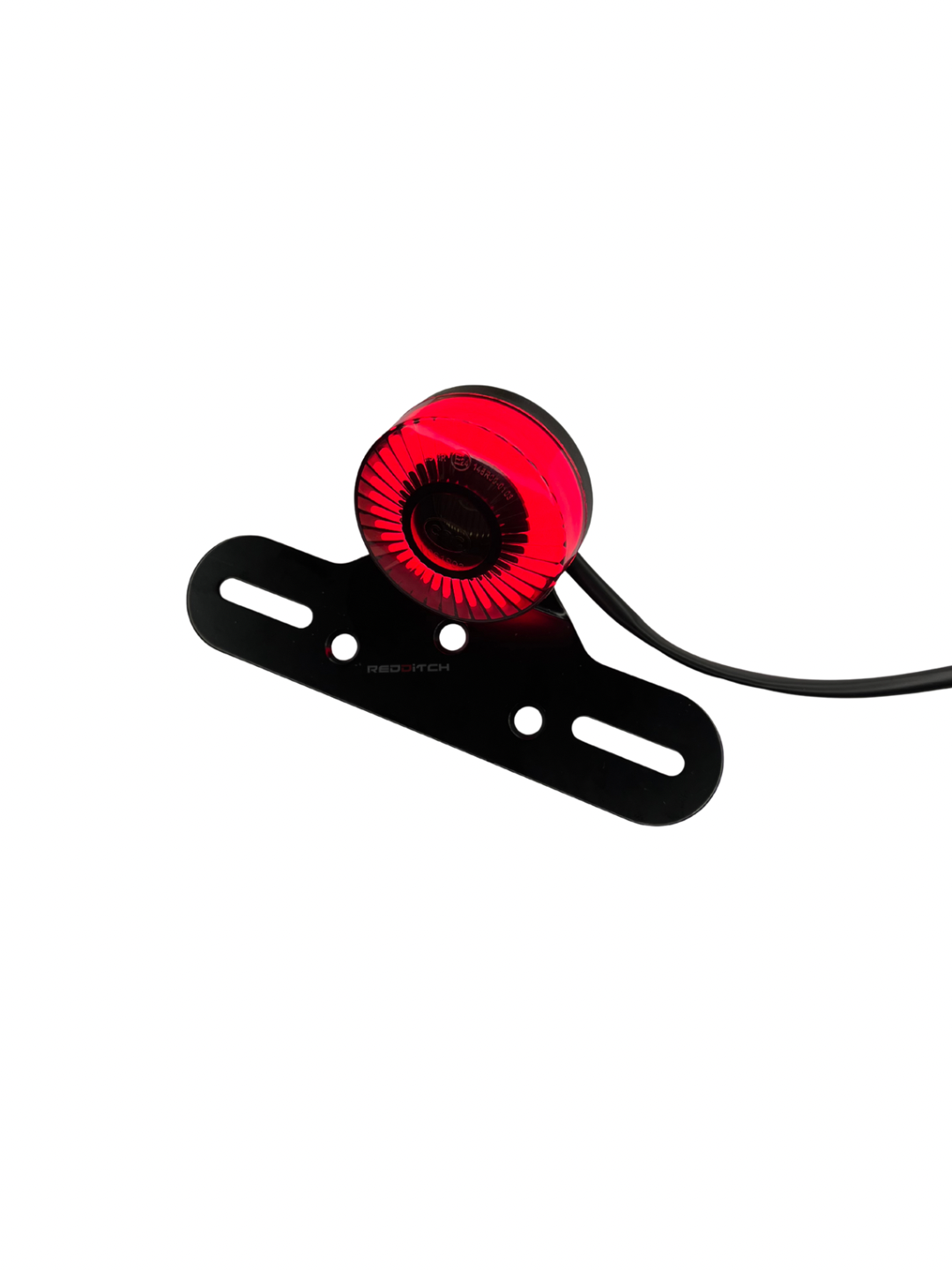 Red light bulb on a black bracket with a white background