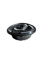 Black and silver automotive speaker on a white background