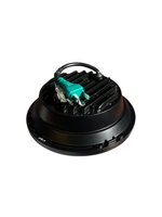 Black electrical connector with green plug on a white background