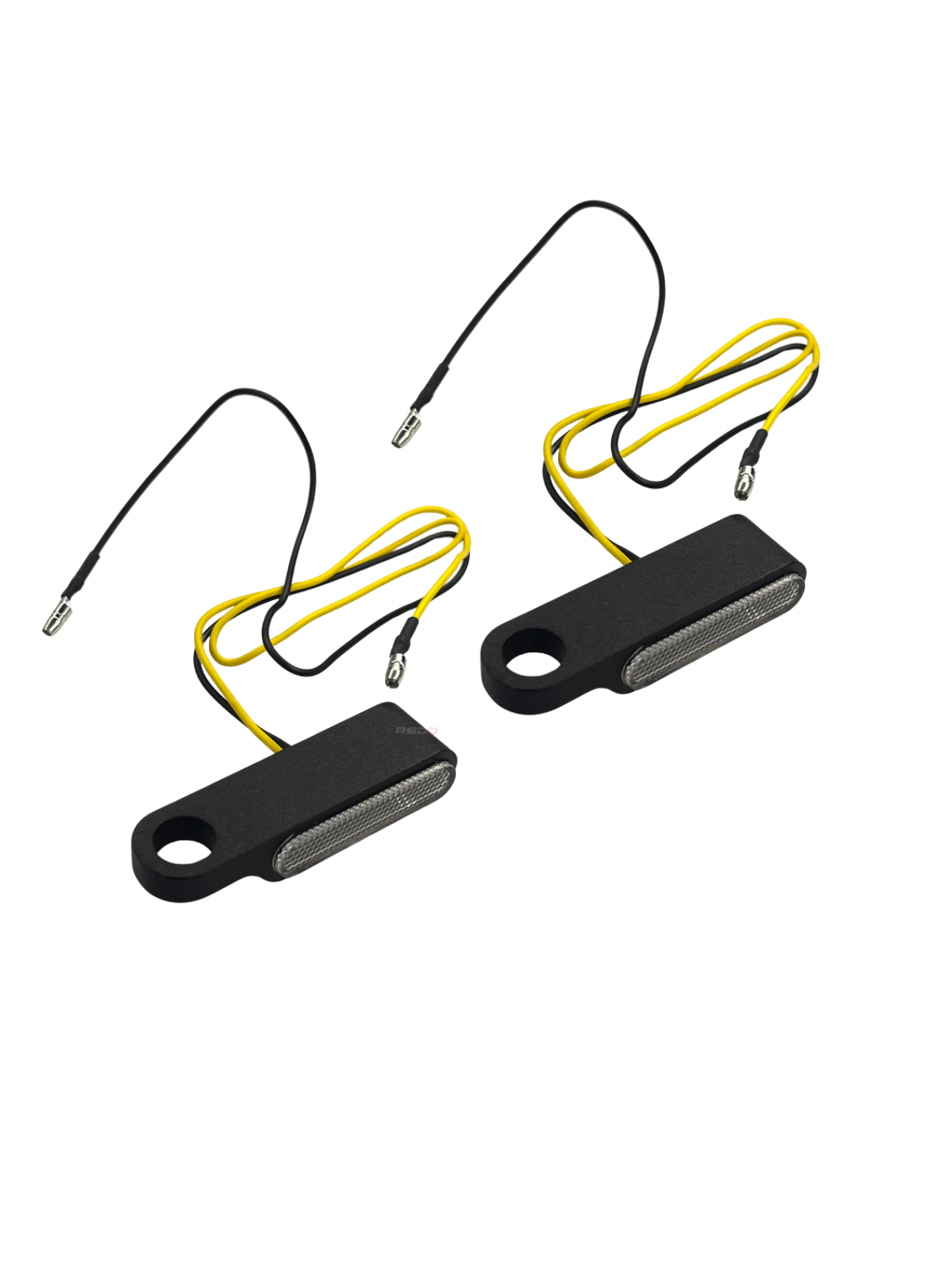 Two black metal sensors with yellow wires on a white background