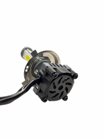 Car headlight bulb housing with wiring on a white background