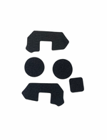 Black adhesive patches on a white background