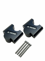 Two black JB Racing clamps with screws on a white background