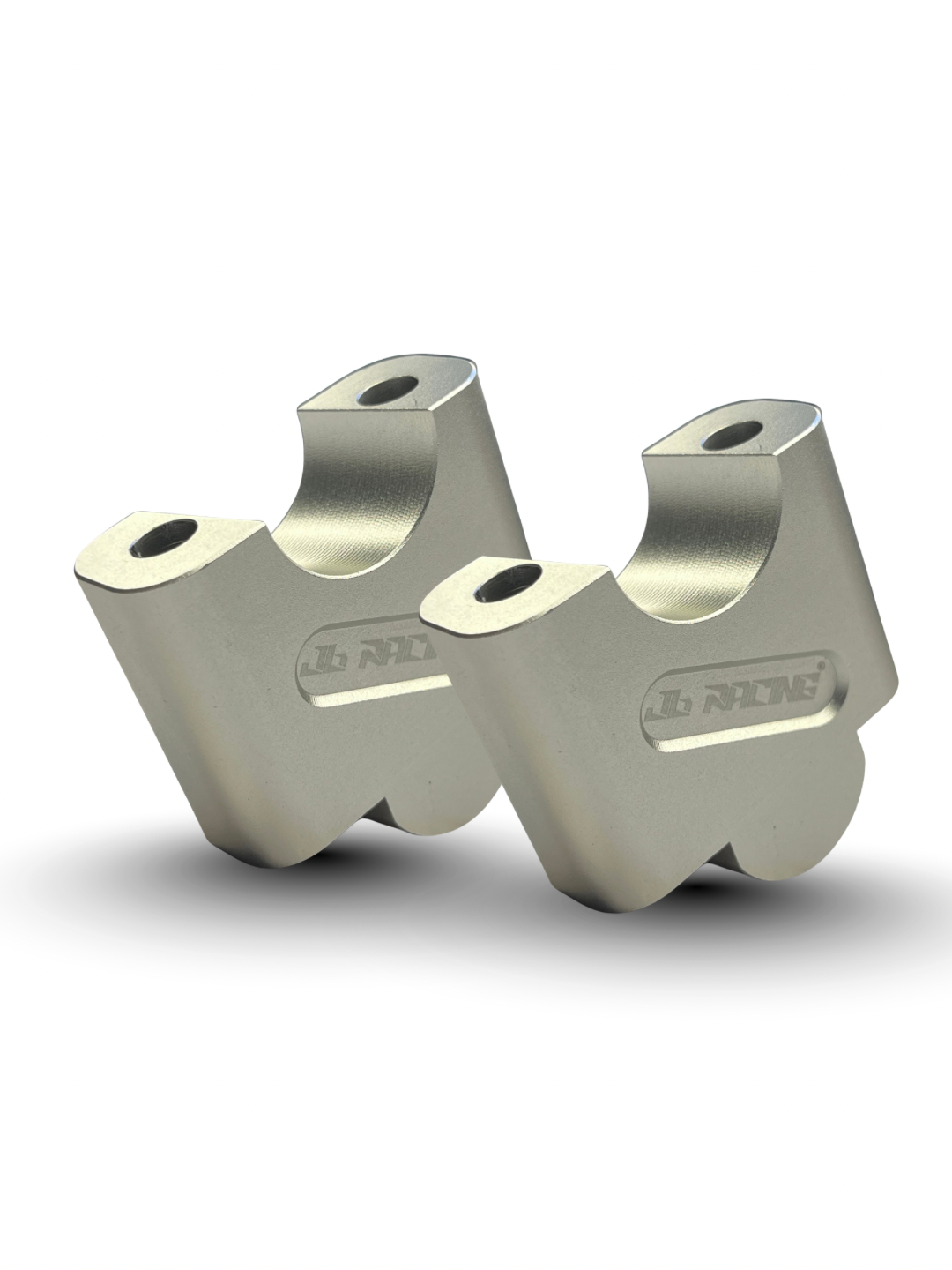 Two metallic components on a white background