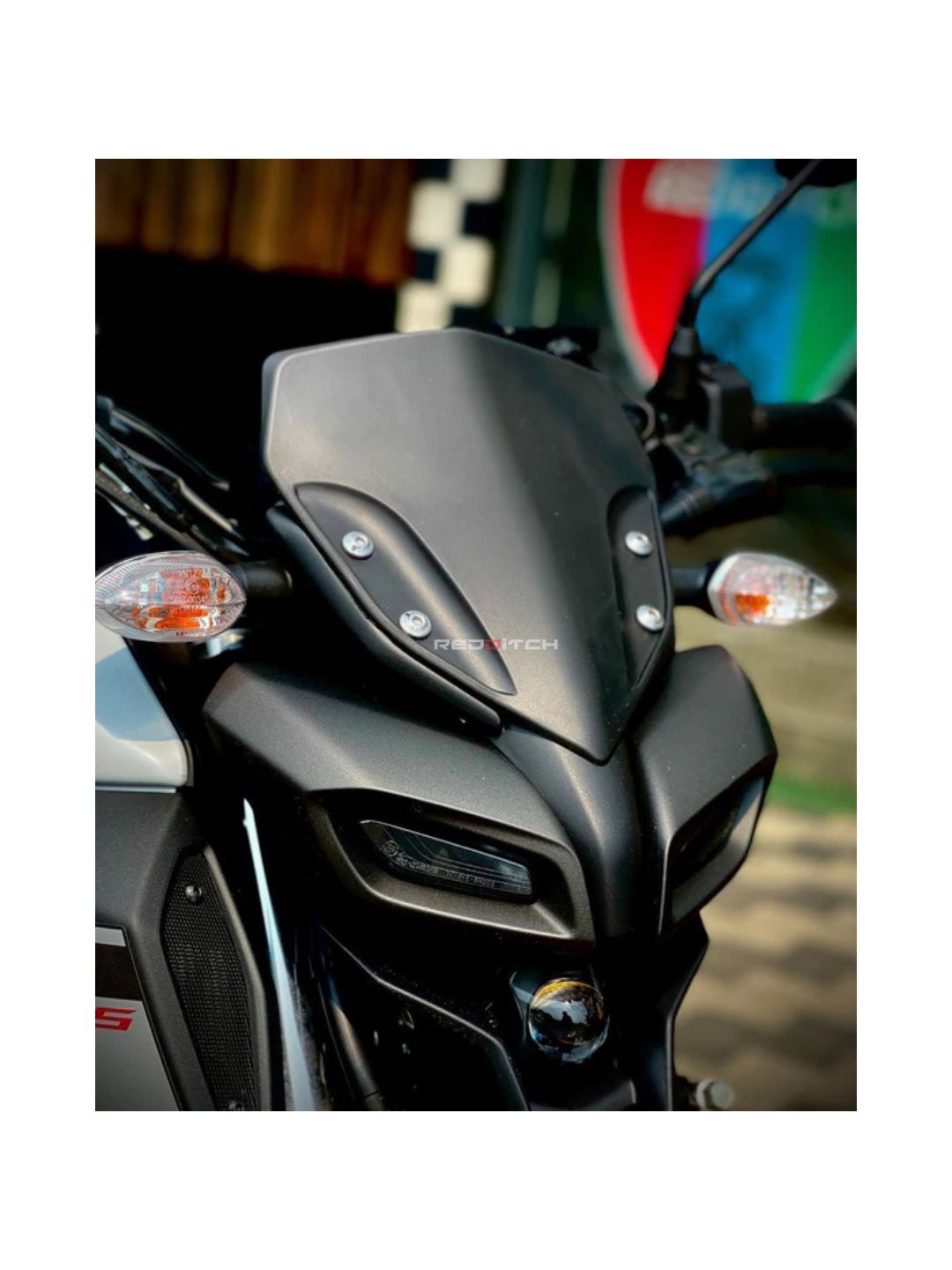 MT 15 Short Matt Visor – a sleek, matte-finished visor designed for the Yamaha MT-15. It offers a modern, understated look while providing essential wind protection. The matte finish enhances durability and reduces glare, ensuring comfort and style for riders who prefer a minimalist design with functional performance.