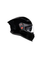Black motorcycle helmet with clear visor on a white background