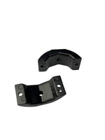 Two black metal brackets on a white background