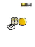 LED light with yellow lens and black casing on a white background