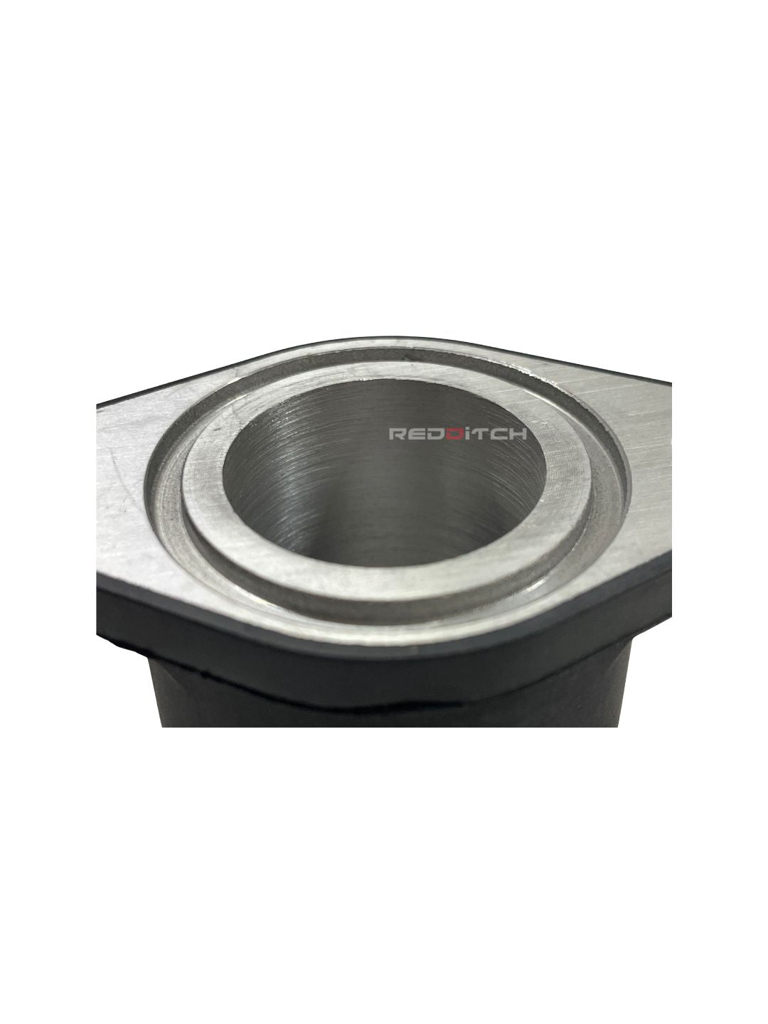 **ALT Text:** ADAPTOR - CARBURETOR (Part No: RLT00011/A) – Precision-engineered carburetor adaptor for optimal fuel flow and engine performance. Ensures durability and a perfect fit. Available at the **best motor accessory shop in India**.