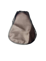 Brown leather saddle pad on a white background