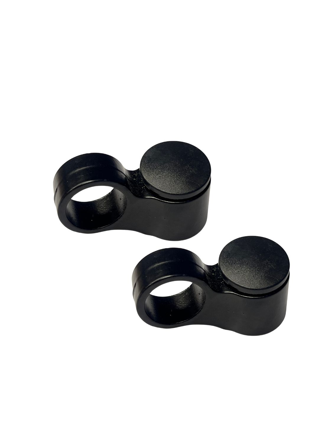 Two black metal connectors on a white background