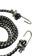 Coiled black and silver rope with metal hooks on a white background