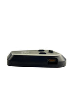 Black electronic device with USB port on a white background