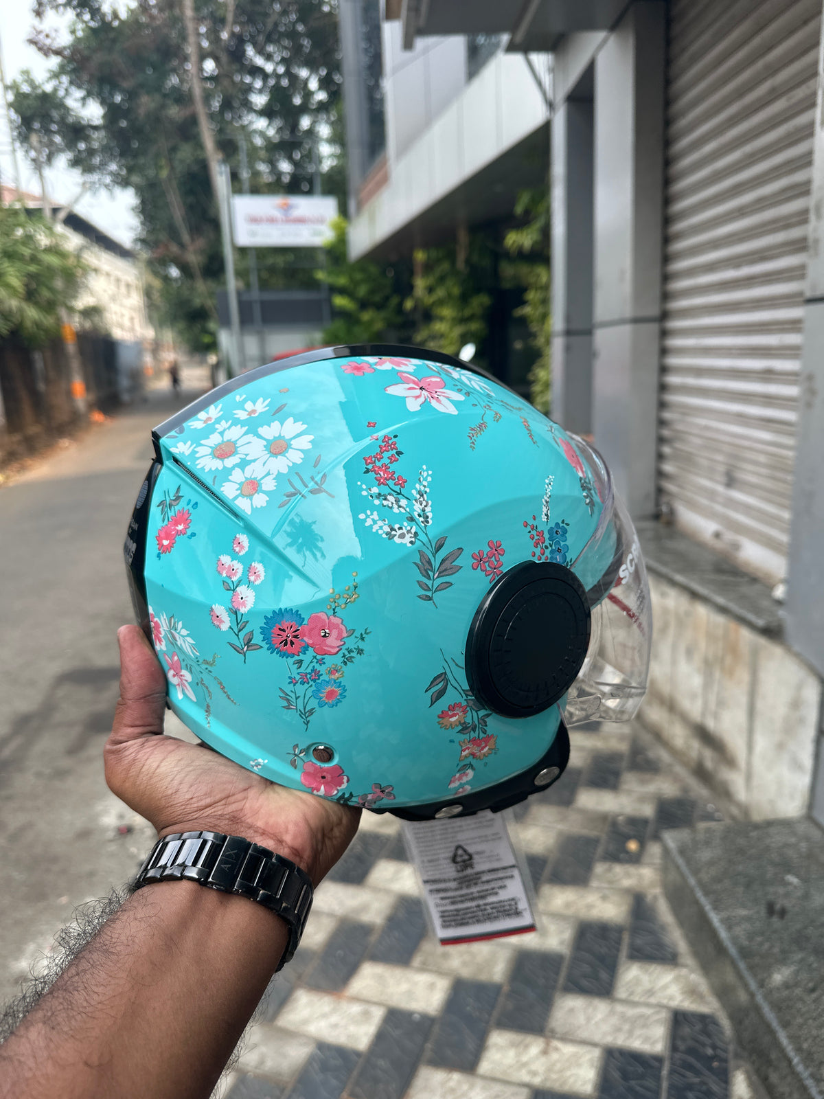 STUDDS URBAN SUPER D2 BLUE WITH FLOWER – Stylish open-face motorcycle helmet featuring a vibrant blue design with floral graphics. Ensures superior protection, comfort, and a secure fit for every ride. Available at the **best helmet shop in India**.