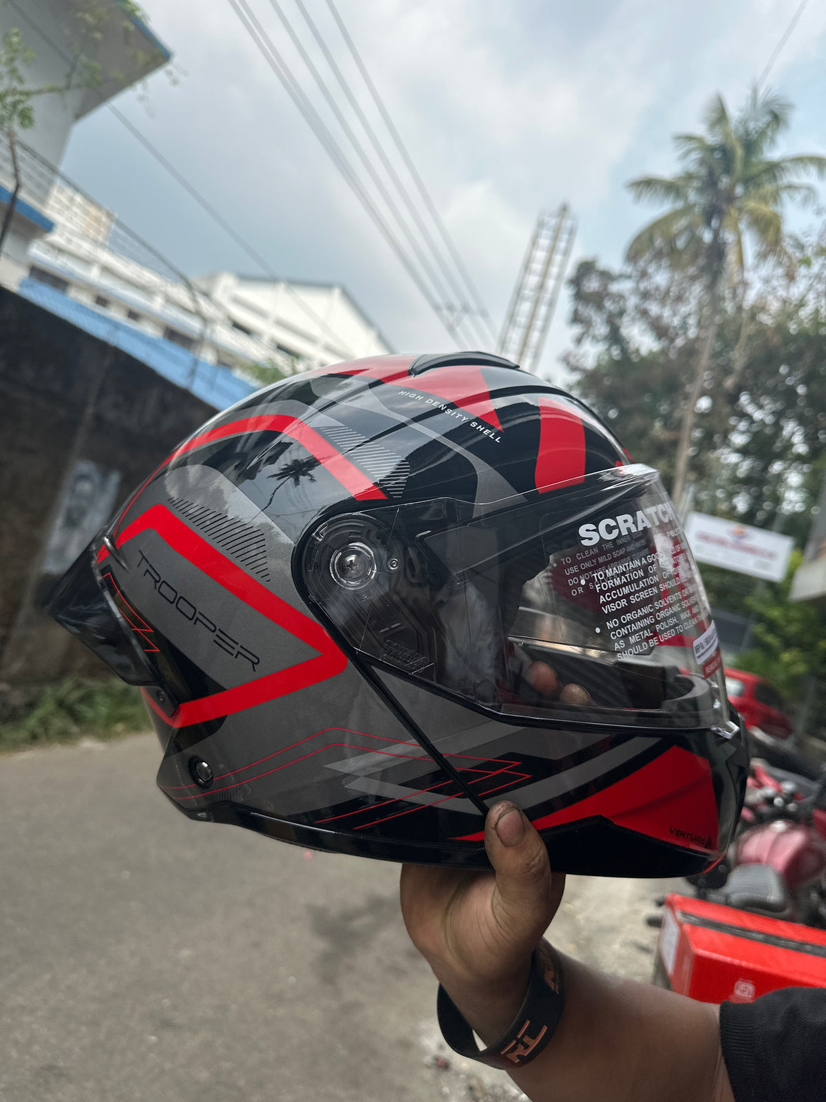 STUDDS TROOPER D3 BLACK N2 RED – Premium modular motorcycle helmet with a bold black and red design. Ensures superior protection, comfort, and a secure fit for every ride. Available at the **best helmet shop in India**.