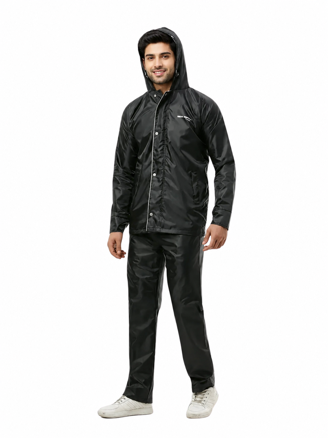 Person wearing a black raincoat and pants on a white background