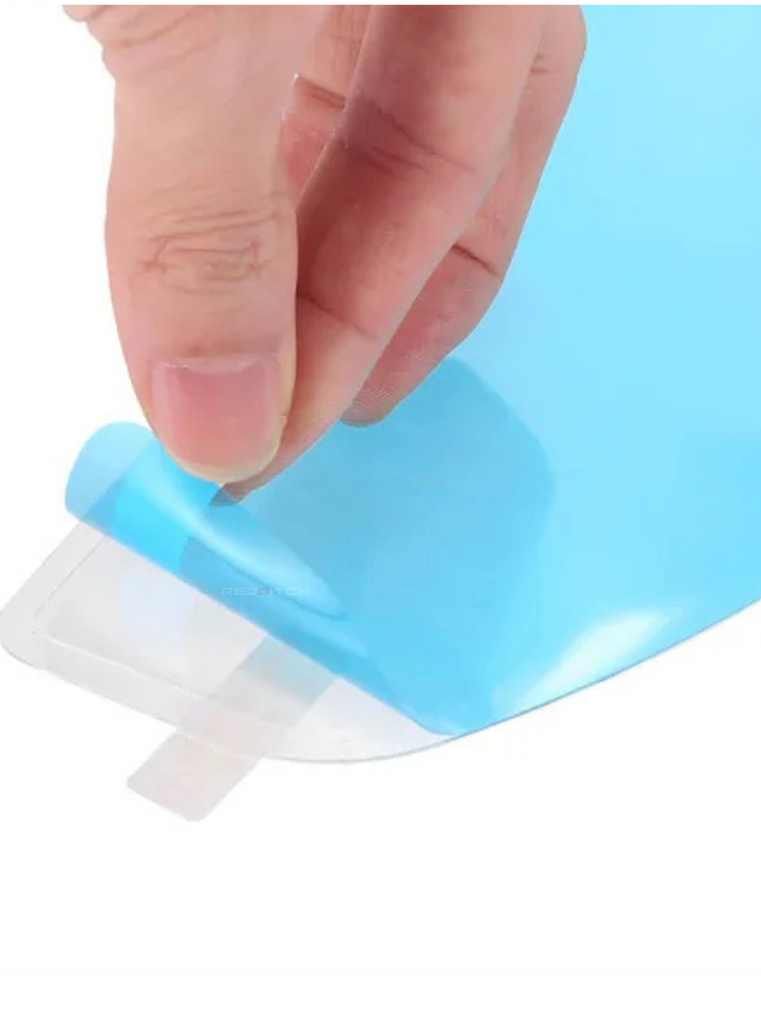 Hand peeling a blue and white adhesive strip