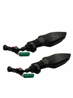Two black motorcycle mirrors with green connectors on a white background