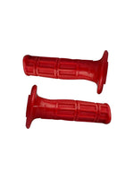 Domino Short Grip in Red, a high-performance motorcycle handlebar grip designed for better control and comfort, featuring a compact design and durable red material for enhanced grip and style.