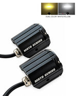 Two black Moto Genius motorcycle LED light reflectors with silver metal connectors and black cables, shown on a white background with a small inset demonstrating dual color output: yellow and white.