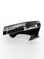 A glossy black plastic automotive bumper lip or front fascia trim piece with horizontal grille slats, photographed on a clean white studio background.