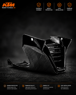 A glossy black motorcycle fairing or body panel shown on a dark studio background, with KTM branding and feature icons at the top and bottom. The product is photographed in dramatic lighting with reflective highlights.