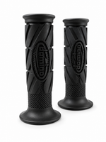 A pair of black motorcycle handlebar grips with textured, ribbed patterns and a central oval logo, displayed on a clean white background.