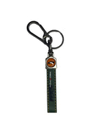 Key Chain Leather with D-Hook, a premium accessory crafted from high-quality leather, featuring a durable D-hook for secure attachment, combining elegance and functionality for everyday use.