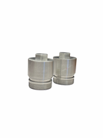 Three metallic cylindrical objects on a white background