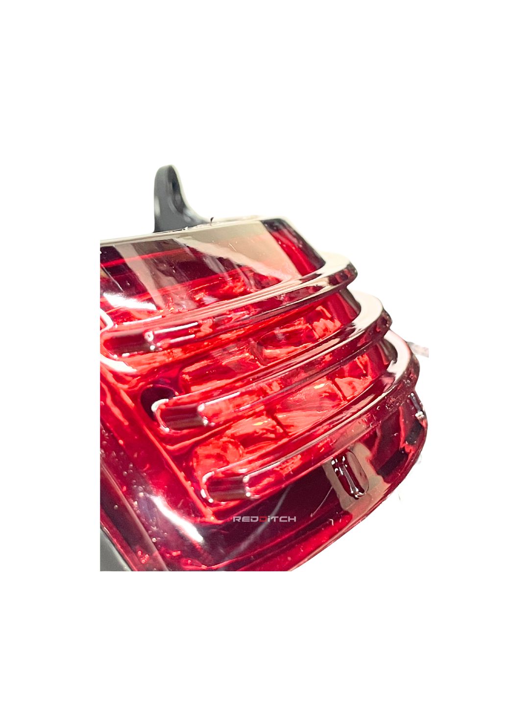 Universal Tail Lamp Red, a versatile motorcycle accessory compatible with various models, offering bright red illumination for enhanced safety and a sleek black finish for a modern look.