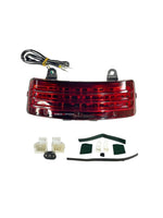 Universal Tail Lamp Red, a versatile motorcycle accessory compatible with various models, offering bright red illumination for enhanced safety and a sleek black finish for a modern look.