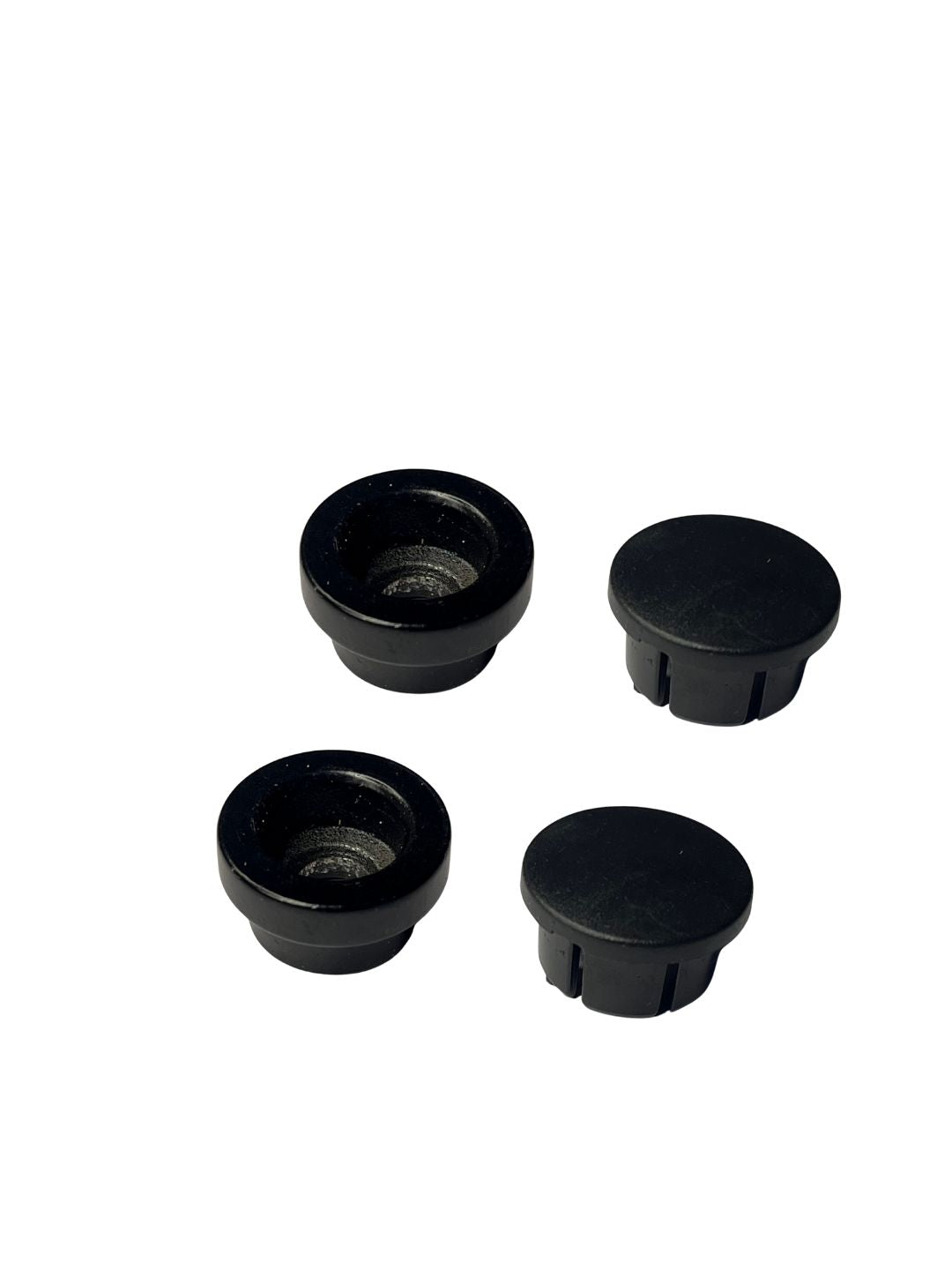 Four black plastic knobs on a white background