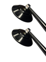 Two black lampshades on white background